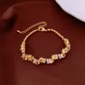 Elegant gold-tone bracelet with multicolored sparkling round cubic zirconia stones. - No 48 Multicolor Round Zirconia Style
