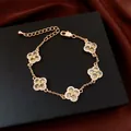 Rose gold four-leaf clover bracelet featuring yellow stones and sparkling micro-pave detail - No 50 Rose Gold Clover Style
