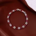 Elegant silver-tone bracelet with red rectangular gems and sparkling white floral stones - No 54 Fuchsia Rectangular Gem Style