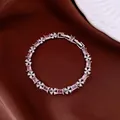 Elegant pink zircon flower bracelet with silver plating on brown satin backdrop - No 55 Pink Rectangular Silver Style