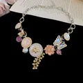Close-up of vintage butterfly and bee charms on a decorative floral necklace - Bee Butterfly Pendant Style / 5# Necklace-Gold-Silver-Pink
