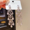 Elegant vintage silver finish zircon tassel earrings for luxury palace style look - Silver