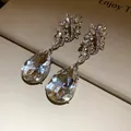 Vintage Baroque style teardrop crystal drop earrings with elegant floral details - Silver