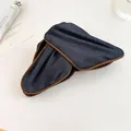 Close-up detail showing the blue denim texture of this elegant fabric hair clip for women - Hair Claw / Blue