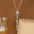 Close-up of silver Y-shape tassel necklace with multicolored rainbow zircon stones - Pentagram Colorful Zirconia Style (9492) / Silver