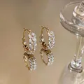 Elegant gold wheat ear hoop earrings with sparkling marquise-cut zirconia stones - Ear Buckle / Gold-White