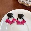 Elegant black heart stud earrings featuring vibrant pink acrylic fringe tassels. - Black - Rose Red
