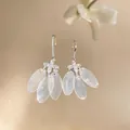 Close-up of elegant silver earrings with zircon flowers and shell leaf tassels - 2# Silver Earring Post - Silver