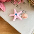 Lovely pink starfish and seashell hair clip with faux pearl detail for beach vacation style - Duckbill Clip (Single Piece) / Pink