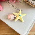 Vibrant yellow starfish and pink seashell hair clip with pearl for beach vacation - Duckbill Clip (Single Piece) / Yellow