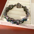 Exklusives Vintage-Armband aus schwarzem Metall mit bunten Zirkonia in Schmuckbox - Kanonengrau-Blau-Grün