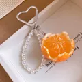 Close-up of simulation tangerine pendant with pearl beaded chain and heart clip - Peeled Orange (AQ410) / Silver Heart Spring Ring / Orange