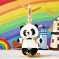 Close-up of cute plush panda keychain wearing a white hoodie with silver lobster clasp - 15cm / Colorblock Hoodie Panda (Chuanyi Panda) / Silver Lobster Clasp / Mustard White