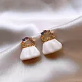 Elegant handbag-shaped earrings with colorful floral handles shown on silk background - Cloud Bag Shape (White) / Gold