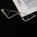 Detailed view of gold W-shaped rimless glasses frame with glittering rhinestones - Type 5 - Gold