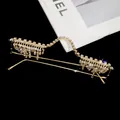 Detail showing the intricate rhinestone-studded W-shaped frame with elegant tassel drops - Type 7 - Gold