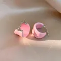 Boucles d'oreilles créoles en émail rose en forme de U pour un style élégant et chic - Rose