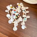 Bohemian style dangling earrings with pearl studs, colorful beads, and shell petals - Silver Needle Studs / Beige Multicolor
