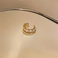 Close-up of elegant gold-plated ear cuff featuring sparkling zircon heart pattern. - Heart Cross Style (4#)