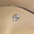 Detailed view of silver ear cuff featuring a sparkling zircon and a white pearl. - Pearl Zirconia Style (8#)
