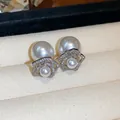 Detailed view of 14K gold plated flower pearl earrings with sparkling pavé crystals - Flower Shape / Silver