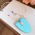 Detail view of blue leather starfish sunglass holder necklace with colorful beads - Sky Blue