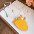 Detail of yellow leather sunglasses holder necklace with colorful starfish and beads. - Yellow
