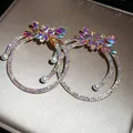Sparkling iridescent rhinestone hoop earrings with white pearls in a luxury gold setting - Silver Pin-Gold-White