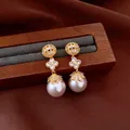 Detail of vintage 18k gold plated flower earrings with elegant white pearl drops - French Lucky Flower (HE34103) / Gold Plated Pink
