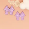 Pair of purple spray-painted alloy bow pendants for DIY jewelry and bag charms - Light Purple