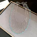 Detailed view of elegant silver fringe lace necklace with sky blue crystal beads - Silver Necklace-Blue Crystal