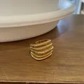 Detailed view of an 18k gold plated multi-layer textured open ring with square design - Open Ring / Gold
