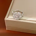 Macro detail view of an elegant silver flower ring with pink and clear zircons. - Ring / Silver-Pink