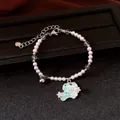 Bracelet de perles doux avec pendentif chien vert menthe et détails en cristal - Bracelet