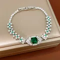 Elegant silver bracelet featuring an emerald green square stone and sparkling white zircons - Bracelet (HB6034-1) / Fold Over Clasp / Green/Silver