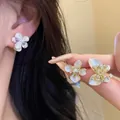 Elegant white pearl flower and butterfly stud earrings with sparkling zircons for women - Mixed Flower and Butterfly Set