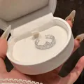 Detailed view of silver crown ring nestled in a white jewelry box - French Hollow Crown Open Style (5#) / Silver