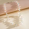 Dettaglio di perline di vetro trasparente a forma di cuore su una collana regolabile - Collana di Perline Cuore / Trasparente-Multicolore