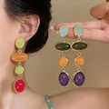 Vintage palace style resin oval drop earrings with colorful beads in gold frame - Multicolor