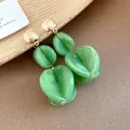 Elegant green marbled acrylic drop earrings with gold studs for a stylish resort look - Earrings (Silver Earring Post) / Green