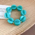 Turquoise marble texture acrylic bead bracelet with gold spherical spacers for women - Bracelet / Light Green
