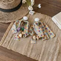 Dettaglio orecchini a fiocco in chiffon con ciondoli a conchiglia su paglia - Stile Conchiglia Pois Multicolore (HE32521)