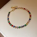 Close-up of an elegant gold-plated bracelet featuring vibrant multi-colored zircons - 37# Bracelet