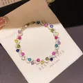 Elegante bracciale placcato oro con zirconi multicolore in un design a onde - 4# Bracciale / Oro Multicolore