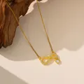 Close-up of gold-plated infinity necklace featuring pave zirconia and a heart charm - Figure Eight with Heart Charm (9243) / Gold