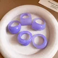 Close-up of five lavender resin rings with geometric shapes on a textured plate - Light Purple 5-Piece Set / 5 Pieces / Purple