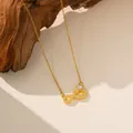 Elegante Halskette aus vergoldetem Titanstahl mit Unendlichkeitssymbol und Herz-Kristall. - Einzelner Zirkon Zahl Acht (9247) / Gold
