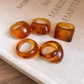 Set of minimalist amber resin rings in various geometric shapes like round and square - Amber 5-Piece Set / 5 Pieces / Brown