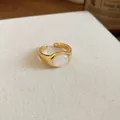Detailed view of an 18k gold-plated open ring featuring a polished white resin inlay - Open Ring / Gold