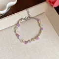 Bracelet marguerite fait main en perles de verre colorées avec chaîne réglable argentée - Bracelet / Blanc-Violet